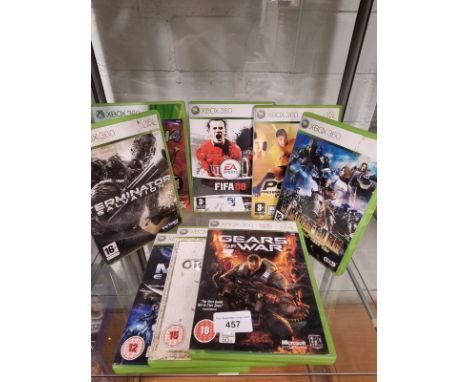 Shelf of xbox 360 games . 