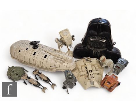 A collection of vintage Kenner Star Wars vehicles and other toys, comprising Rebel Transport, X-wing, AT-ST, a Tauntaun, a Da