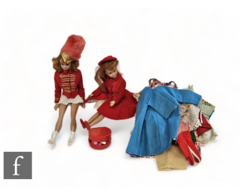 Two 1960s Mattel Barbie dolls, Midge (straight legs, red hair) wearing incomplete Drum Majorette outfit, and Skipper (straigh