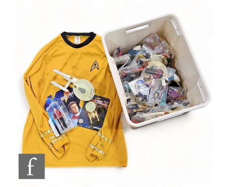 A Captain Kirk Star Trek cosplay shirt, size XL, together with an assorted collection of Star Trek related props, games, die 