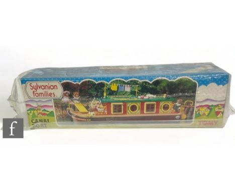 A vintage Tomy Sylvanian Familes Canal Boat, boxed. 
