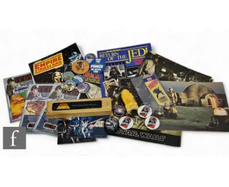 A collection of assorted vintage Star Wars items, to include Thomas Salter Action Transfers, a Lyons Maid ice cream wrapper, 