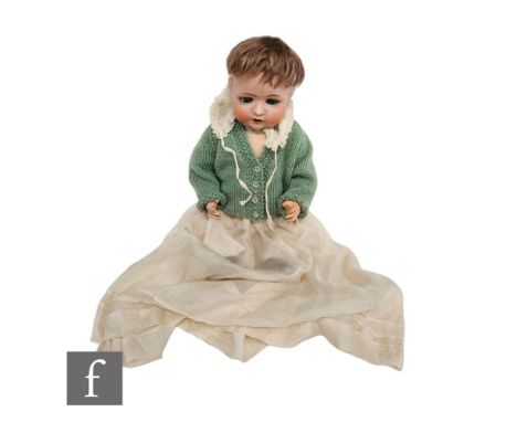An early 20th Century Bahr and Proschild bisque socket head doll, head mould 678, with sleeping blue eyes with lashes, open m