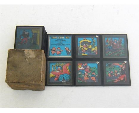 A complete set of 24 original 3 ¼ inch Walt Disney “Three Little Pigs” lantern slides in original box by Ensign Ltd. “By arra