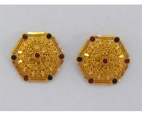 A pair of Middle Eastern gold ear studs, of hexagonal filigree design, accented with enamel, 19mm diameter, unmarked (tests h