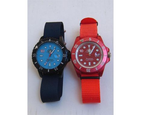 Two EMAS aluminium and ceramic quartz sports watches, in blue and red, the dials marked for 165ft/50m, both with fabric strap