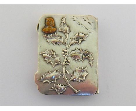 A French silver-plated stamp case, circa 1900, of shallow oblong form with rounded corners, sprung cover, twin compartments, 