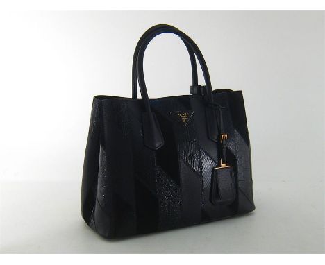 Prada, a black leather and suede ‘patch’ handbag, with shoulder strap, twin compartment, with an integral wallet compartment 