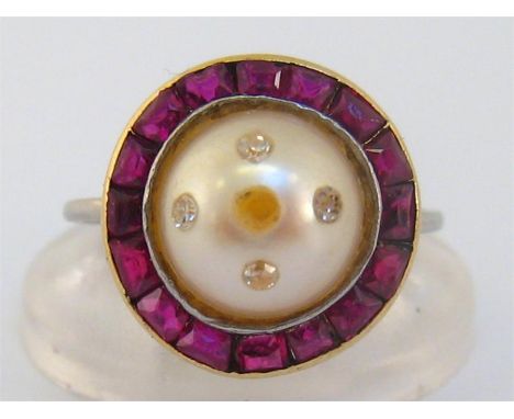 A cultured pearl, ruby and diamond ring, the entire drilled pearl 8.8mm diameter, set with four small brilliants, in a surrou