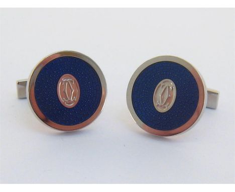 Cartier, a pair of silver and guilloche enamel cufflinks, numbered 6110AH, the circular links with Cartier logo to the centre