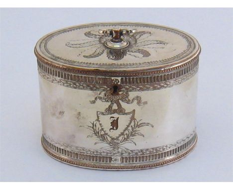 An Old Sheffield Plate oval tea caddy, circa 1785, front engraved with ribbon-tied shield cartouche initialled “I”, bands of 