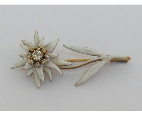 A late 19th century gold, enamel and diamond ‘Edelweiss’ brooch by Tiffany & Co, set with a cluster of brilliants, the centra