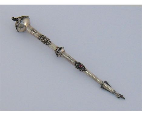 Judaica:- a Torah pointer bearing spurious Russian marks, lion finial and applied lion mask, applied to either side with past