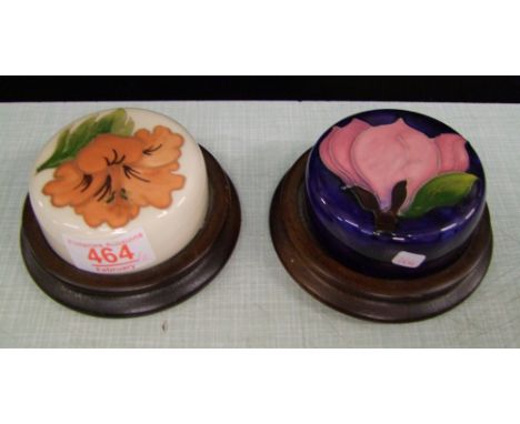 Two Moorcroft paperweights Magnolia and Hibiscus patterns: first in quality. 