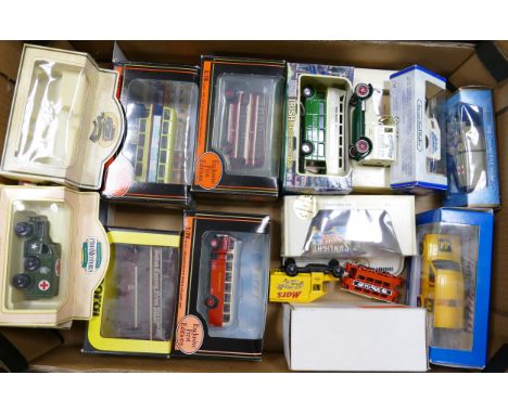 A collection of exclusive first additions and similar boxed buses and advertising vehicles: 