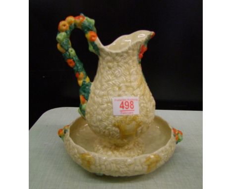 Two Clarice Cliff celtic harvest items: large jug and strainer dish 