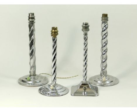 CHROMED TABLE LAMPS. Four chromed barley twist lamp bases with button switches. Tallest 31cm.Condition: Good condition. All r