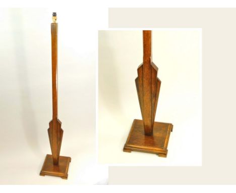 OAK FLOOR LAMP. An oak floor standing lamp with decorative column. Height 155cm. Condition:Good condition. Requires modern wi