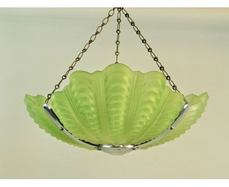 CLAM SHELL SHADE. A light green frosted glass light shade of three-section clam shell design in chromed frame.Condition: No d
