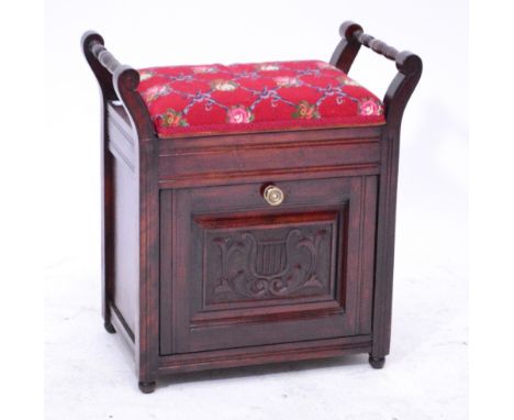 An Edwardian mahogany piano stool with hinged tapestry seat, height 61cm, width 57cm. CONDITION REPORT: Appears good with no 