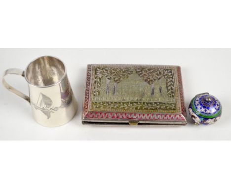 An Iraqi white metal tapering mug engraved with architectural landscape and masted boat, height 6cm, unmarked, a small white 