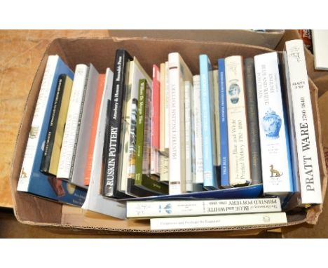 A quantity of books on blue and white porcelain, pottery designers and ceramic tiles to include Godden's guide to English blu
