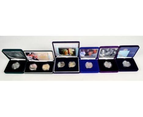 A cased Her Majesty the Queen Jubilee silver proof two coin crown set 2002, a cased 2003 coronation anniversary silver proof 