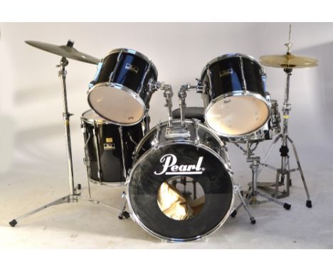 A Pearl drum kit with stool.
