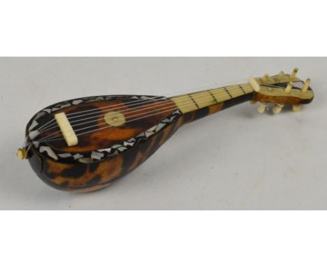 A tortoiseshell, ivory and mother of pearl inlaid miniature bowl back mandolin, length 14cm.