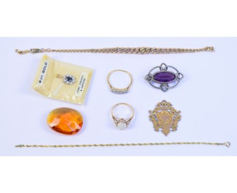 A small group of jewellery comprising an 18ct yellow gold five stone diamond ring, size S, a 9ct example set with opal oval c