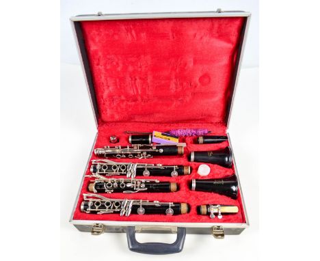 A Boosey and Hawkes of London "Emperor" clarinet and "Regent" clarinet, in original case.