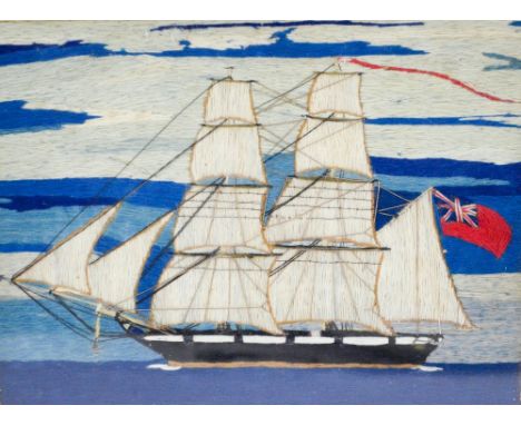 A mid 19th century sailor's valentine woolwork depicting HMS Cygnet with red ensign Royal Navy flag, titled verso, 21.5 x 27c