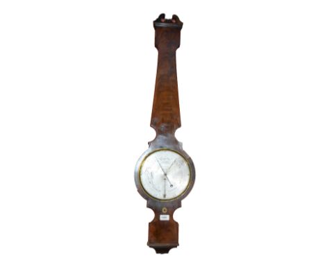 An early 19th century mahogany wheel barometer with circular silvered dial set with thermometer and inscribed "Bregazzi, Derb