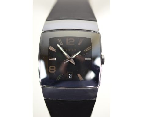 RADO; a gentleman's Diastar ceramic wristwatch with silvered square rim, with black dial set with baton and Arabic numerals w