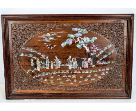 A Chinese rosewood rectangular panel/tray with oval figural garden scene on carved foliate scroll ground, 63 x 41cm.