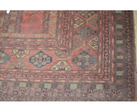 A very large red ground Tabriz carpet, 410cm x 300cm.