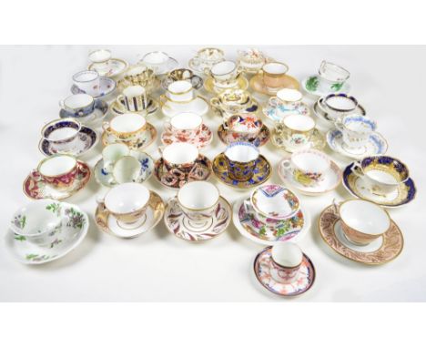 A large collection of tea cups and saucers to include Minton, Royal Crown Derby, Wedgwood, Worcester, Davenport and Mauchin. 