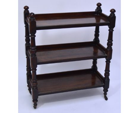 A Victorian mahogany three tiered buffet of rectangular form with ring turned and carved supports on castors, 90 x 41cm, heig