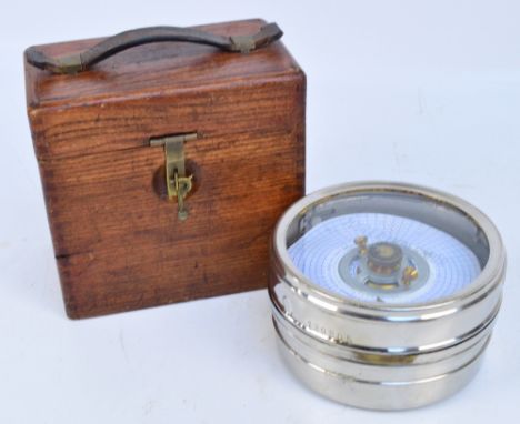 An oak cased automatic timing clock for pigeon racing, clock no.189805, bearing plaque "Altrincham.S.C 23", the box bearing c