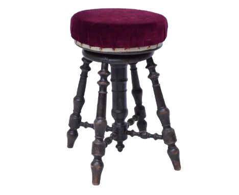 A Victorian adjustable piano stool with ring turned stretched supports, diameter 33cm.