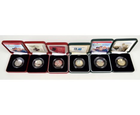 Six cased various commemorative silver proof 50p coins to include the Victoria Cross 2006, 150 Years of Public Libraries, and
