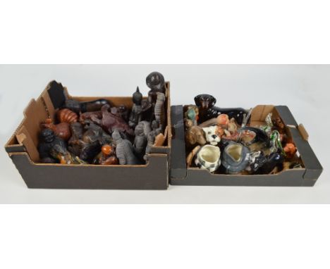A collection of various Oriental figures including Chinese rootwood carving of a fisherman and a group of terracotta army sol
