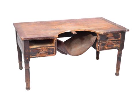 A large pine table with cut section to the top, drawers and ring turned support, lacking two of the drawers, width 153cm.