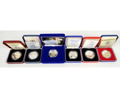 Five various cased silver proof commemorative crowns to include Elizabeth II 90th birthday, coronation 40th anniversary and a