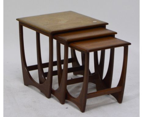A nest of three teak G-plan tables, top 50 x 50cm. CONDITION REPORT: This is solid teak , they are in solid condition with no