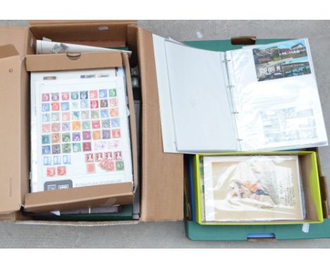 STAMPS AND POSTCARDS in two boxes, world issues in stockbooks, various covers including album of Malaysia First Day Covers.