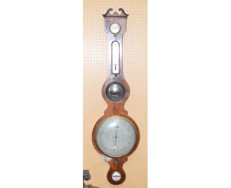 A late George III mahogany and boxwood strung five dial wheel barometer inscribed "C.Somalvico 11 Brook St.Holbn.", height 11
