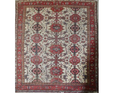 A red ground Tabriz carpet, 360cm x 290cm