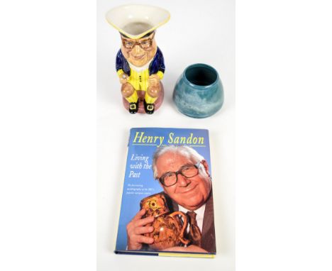 A Henry Sandon limited edition 245/750 Kevin Francis character jug, a signed copy of "Living with the Past", and a Royal Worc