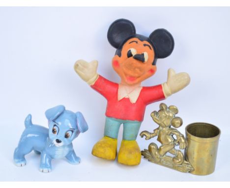 A vintage WD Productions bendy Mickey Mouse toy, height 23cm, a brass Walt Disney Productions walking Mickey Mouse vase, heig